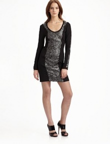 Modern fit pairs with metallic sequin insets for a sleek, sophisticated statement for evening.Scoopneck with chiffon trim Metallic leather sequin insets adorn the long sleeves Silk chiffon center panel with metallic leather sequins Back zip closure Back princess seams About 33½ from shoulder to hem 65% polyester/30% rayon/5% spandex Second fabric: silk Dry clean Imported
