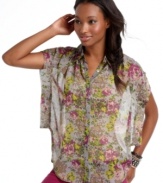 Spring into colorful style with this top from Fire! Featuring a floral print and dramatic kimono sleeves, this button down will keep you cool on easygoing days!