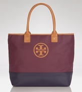 Take this season's color block trend with you anywhere and fill it with everything. This dipped canvas tote from Tory Burch flaunts practical style, sturdy trims, and a must-have mixed media finish.