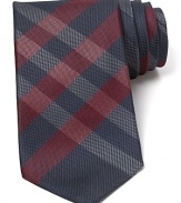 Burberry London preserves its heritage with a sophisticated signature check tie, crafted for a classic look that pairs well dressed up or down.