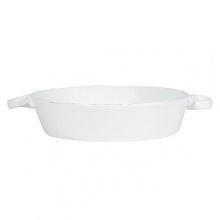 An effortless collection that transitions seamlessly from your kitchen to the table, these exceptional serving dishes solidify your presentation with down-to-earth elegance. Crafted in Tuscany from Italian stoneware, and featuring unique, rustic shapes with modern details, these pieces are built to last, both in terms of style and functionality.