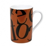 Whimsical drinkware to add fun and color to the table. Konitz mugs feature the highest quality color and glaze. A collage of black, jumbled letters on a brown ground.
