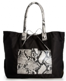 Set summer on fire with this Brasil-inspired tote from FALCHI by Falchi. Sleek snakeskin accents and a femme bow closure add polished touches to this wild design. Set summer on fire with this Brasil-inspired tote from FALCHI by Falchi. Sleek snakeskin accents and a femme bow closure add polished touches to this wild design.