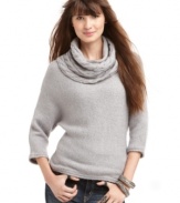 Get set for the cold in Pink Rose's three-quarter sleeve sweater, punctuated by cable turtleneck.