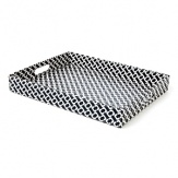 DIANE von FURSTENBERG's signature chainlink pattern jumps from the dress to a fashion forward collection of housewares.
