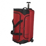 A compact, streamlined cargo bag for the jet set. Large, U-shaped opening into spacious main compartment. Zippered front pocket provides quick access.