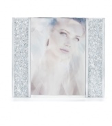 Make your memories shine even brighter with the Starlet picture frame. Sparkling Swarovski crystals along the frame's edges, surround your photo for a sophisticated sensibility.