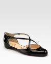Distinguished patent leather Mary Jane features criss-cross straps and an ankle snap closure. Patent leather upperLeather liningSignature red leather solePadded insoleMade in ItalyOUR FIT MODEL RECOMMENDS ordering one half size up as this style runs small. 