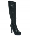Toweringly tall and extremely smooth. GUESS's Zala platform boots add classy sophistication to your look.