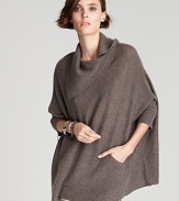 A plush Aqua Cashmere poncho is the sumptuous layer of the season-perfect as the temperature drops. Designed with an asymmetric collar, team it with color-pop skinnies or a pair of cropped trousers and head out into the day.