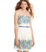 Spring into fresh style with this strapless dress from Trixxi, where colorful flowers bloom over a sweet, pleated design!