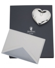A lovely stationary set for the doting pen pal, Ballet Ribbon notecards embossed with dreamy heart-shaped strokes match silver-lined envelopes and a silver-plated paperweight. All in an elegant gift box. A lovely stationary set for the doting pen pal, Ballet Ribbon notecards embossed with dreamy heart-shaped strokes match silver-lined envelopes and a silver-plated paperweight. All in an elegant gift box.