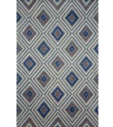 An ultra-mod diamond design is infused with classic color upon this stylish Ravella Kallia area rug from Liora Manne. Neutral and cool tones make this design accessible to any room décor and its hand-tufted detailing makes it durable enough to withstand heavy traffic, indoors or out.