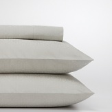 Inspired by the beauty of a floating lotus, these patterned pillowcases embody simplicity and modern sophistication.