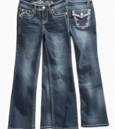 Sweet for her feet. These bootcut jeans from Revolution set off her fashionable footwear choices.