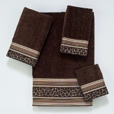 Luxurious sheared velour towel is embellished with a contemporary border featuring cheetah animal print. Accented top and bottom with coordinating stripes in browns and neutrals.