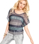 6 Degrees unites stripes of all textures on a day top that's so unique! Rock the piece with an arm load of bracelets and your favorite skinny jeans.