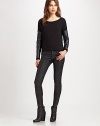 Crinkly faux leather sleeves and a contour front hem turn a simple pullover into a major style statement. BoatneckDropped shouldersLong faux leather sleeves with knit cuffsCropped front hem with back faux leather accentFully lined58% viscose/31% cotton/6% wool/5% spandexDry cleanMade in USA of domestic and Italian fabricModel shown is 5'10 (177cm) wearing US size Extra Small/ Small.