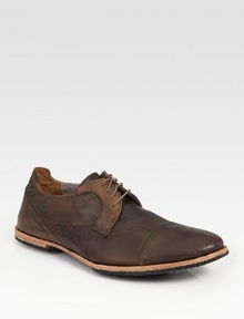Cap-toe design constructed in lightly distressed leather for the look of a well-worn favorite.Leather upperLeather liningPadded insoleRubber soleImported