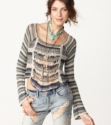Free People's striped top is cropped with a totally casual look. Pair it with lived-in jeans and a bold necklace for a slightly edgy outfit.