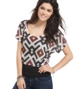 The Classic gets graphic with this rhinestone embellished crop top! Pair it with your fave jeggings for a look that elongates!