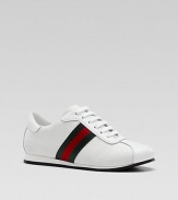 Lace-up style in original GG fabric, with striped web detail and leather trim.Fabric upper Lace-up closure Rubber sole Made in Italy Additional InformationKid's Shoe Size Guide (European Equivalent) 