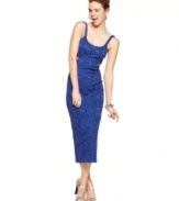 Pop like pop art in this midi dress from Material Girl! A zesty print plus side cutouts add major spunk to this curve-hugging day-to-night number!