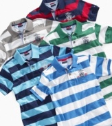 Variety of styles. He can choose the right color to match his look with this basic polo shirt from Tommy Hilfiger.