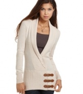 The three buckle detail on this lightweight knit from JJ Basics is ultra-chic. Toss it over a muted tank and pair it with jeggings.
