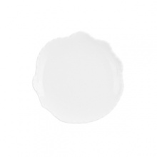 An organically scalloped, off-white dinnerware pattern that contributes elements of both texture and design to your dining experience.