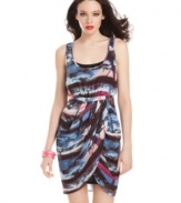 Get swept away in a dream dress from GUESS?, where a gorgeously draped, tulip design meets a relaxing, palm-tree-studded print!