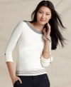 This Tommy Hilfiger sweater is punctuated by classic details like ribbed striped trim and roll tab sleeves. The goldtone buttons add a luxe touch, too!