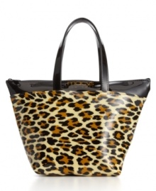 A golden Macy's New York logo amplifies the warm hues of always-chic leopard print on this glossy mini tote that's just the right size for quick errands. A golden Macy's New York logo amplifies the warm hues of always-chic leopard print on this glossy mini tote that's just the right size for quick errands.