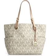 Make a signature statement this season with Michael Kors' chic logo print tote.
