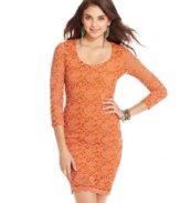 Doll-up in American Rag's alluring, three-quarter sleeve evening dress! A lace overlay and curve-hugging silhouette sets the pace for others to follow.
