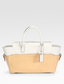 Glazed bridle and vachetta leather pair together in this sumptuously-sleek colorblocked carryall.Double top handles, 6¼ dropThree outside open pocketsProtective metal feetOne inside zip pocketThree inside open pocketsCotton lining14¼W X 9¾H X 5DImported