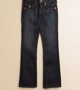 Dark wash denim with subtle whiskering, decorative contrast stitching with snake eyes pocket detail and slight fading on the thighs in a classic bootcut silhouette.Front snap closureAdjustable waistband with belt loopsZip flyFive-pocket styleCottonMachine washImported