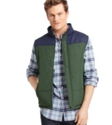 Bulk up on scholastic style with this lightweight varsity puffer vest from Izod.