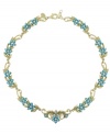 Playful shapes and vibrant hues are making a huge comeback this season. 2028's subtly sparkling collar necklace features turquoise acrylic beads and glass accents in a pretty floral pattern. Set in gold tone mixed metal. Approximate length: 15 inches + 3-inch extender.