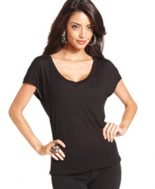With a stylish slouch, this GUESS boyfriend tee is a go-to staple for any fashion-forward look! With a stylish slouch, this GUESS boyfriend tee is a go-to staple for any fashion-forward look!