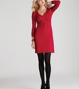 A flattering v neckline and empire waist lend eye-catching allure to the body-skimming silhouette of this Three Dots dress.