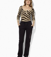 A classic waffle-knit cotton Henley channels modern style with chic three-quarter sleeves and an exotic zebra print.