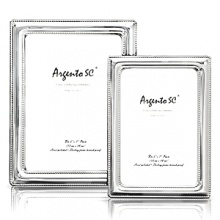 Photo frames by Argento feature unique and authentic tarnish free sterling silver. Hand made and uniquely crafted in Italy. Photo frames by Argento feature unique and authentic tarnish free sterling silver. Hand made and uniquely crafted in Italy.