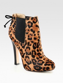 Luxe leopard-print calf hair forms this towering silhouette with an unexpected lace-up suede back. Leather-covered heel, 4¾ (120mm)Hidden platform, 1 (25mm)Compares to a 3¾ heel (95mm)Leopard-print calf hair upper with side elastic gores and suede trimPull-on styleLeather liningLeather and rubber solePadded insoleImported