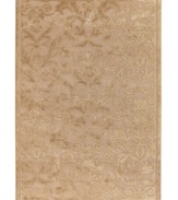 Enhance your decor with the oh-so-luxe look of Couristan's Pave Vintage Damask rug. Woven of a soft blend of viscose, silk and chenille for an unbelievably plush feel and a high-low carved effect, the rug features an elegant damask motif rendered in a luminous pearl shade, adding a touch of vintage-inspired glamour to any space.