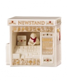 An essential part of holiday preparedness, the newstand is where Mistletoe Park residents go to read up on holiday decor, get ideas for a gourmet Christmas and buy milk for Santa's cookies. With incredible gold detail and trim in ivory porcelain. An essential part of holiday preparedness, the newstand is where Mistletoe Park residents go to read up on holiday decor, get ideas for a gourmet Christmas and buy milk for Santa's cookies. With incredible gold detail and trim in ivory porcelain.
