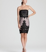 Sue Wong gives off an air of mystery with this alluring strapless dress, adorned with dark lace and beaded details.