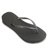 The original style gets an update with more feminine slim looking straps. Wear these basic waterproof rubber flip flops anywhere. Logo embossed solid thong strap and logo debossed cushioned footbed.