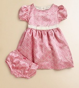 A pretty lace print on lustrous satin charmeuse makes the loveliest party dress for your little princess.Round necklineShort puffed sleevesBack button closeEmpire grosgrain ribbon waist with bowFull skirtFully lined in satinMatching bloomers with elasticized waist and leg openingsPolyesterMachine washImported Please note: Number of buttons may vary depending on size ordered. 