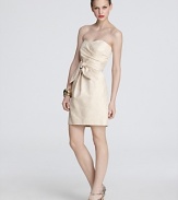 A subtle metallic sheen glams up this Shoshanna strapless dress, complete with an oversize tie at the waist for an added dose of drama.